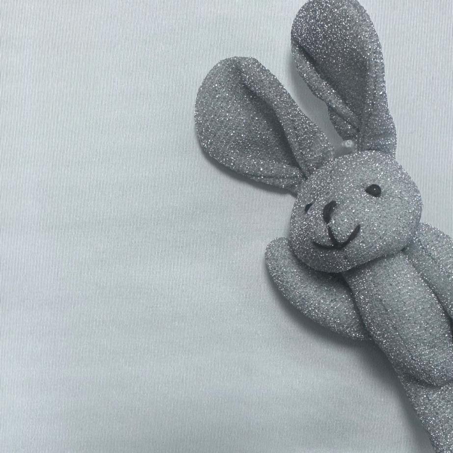 Éadach Aicéatáit mar Fabraic Bonn Téip